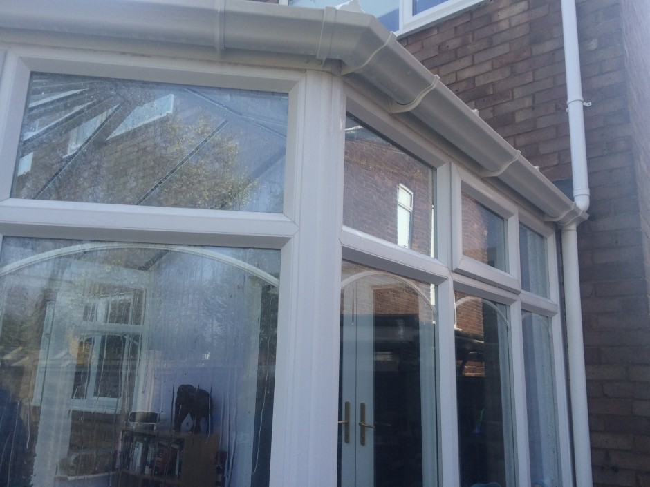 Close Up Of Clean Conservatory Windows & Gutter